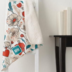 Modernes, minimalistisches Blumenmotiv mit beigem  Sherpadecke