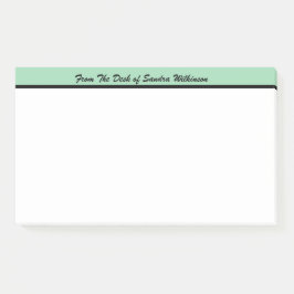 Modernes Monogramm vom Schreibtisch der Post-it Klebezettel