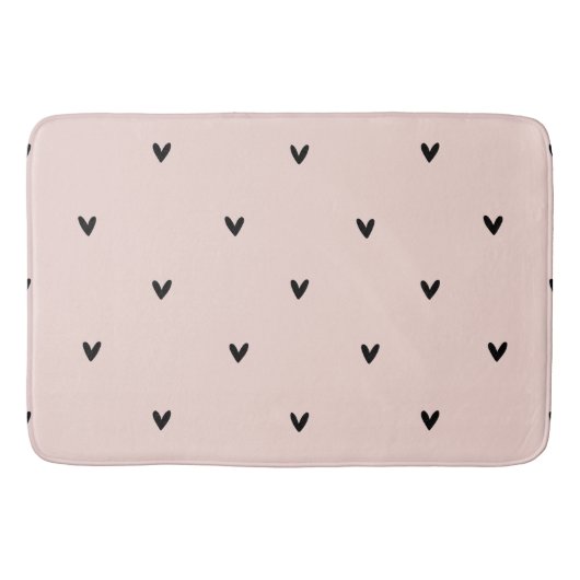 Modernes, pastellrosa und schwarzes Herzmuster Badematte (Vorderseite)