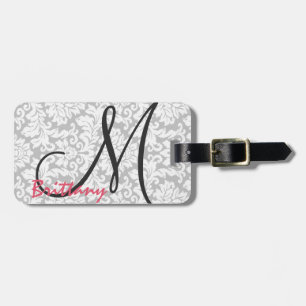 Modernes schickes schwarzes Monogramm auf grauem Gepäckanhänger