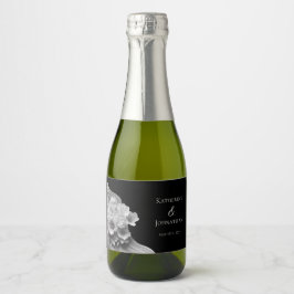 Modernes Schwarz mit Blumen und Weiß Schaumweinetikett