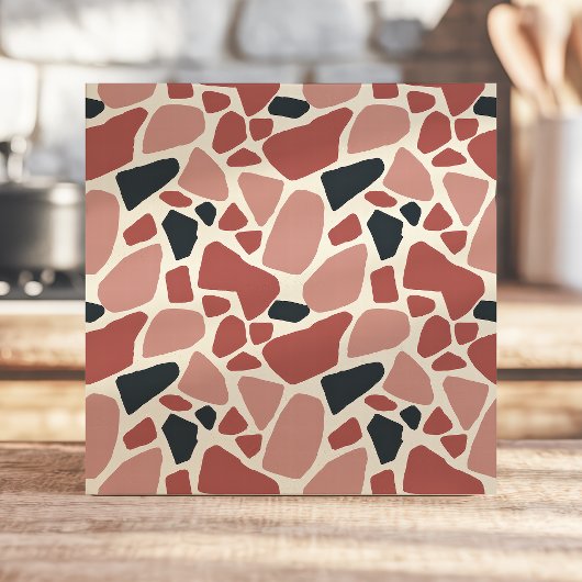 Modernes Terrazzo-Design in Rot und Schwarz Fliese