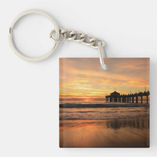 Mole über dem Ozeanstrand Sonnenuntergang Schlüsselanhänger