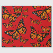 Monarch Butterfliegen auf Rot Geschenkpapier (Flach)