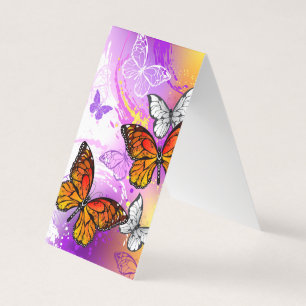 Monarch Butterflies on Purple Background