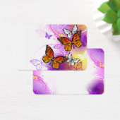 Monarch Butterflies on Purple Background (Schreibtisch)