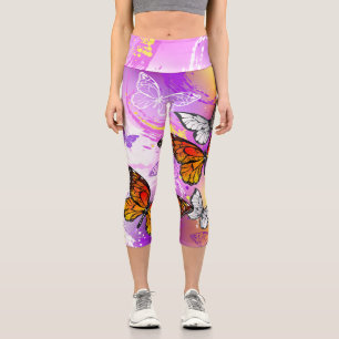 Monarch Butterflies on Purple Background Capri Leggings