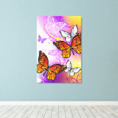 Monarch Butterflies on Purple Background Leinwanddruck (Insitu (Holzboden))
