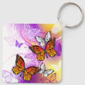 Monarch Butterflies on Purple Background Schlüsselanhänger (Rückseite)