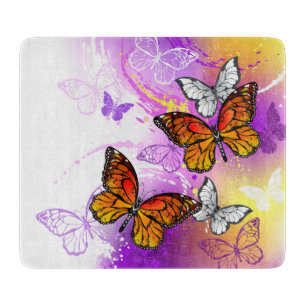 Monarch Butterflies on Purple Background Schneidebrett