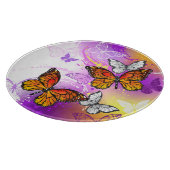 Monarch Butterflies on Purple Background Schneidebrett (Ecke)