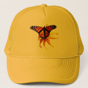 Monarch ruht auf einem braunen mit Augen Sushan Truckerkappe