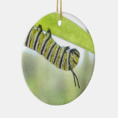 Monarch-Schmetterlings-Raupe, die einen Milkweed Keramikornament (Rechts)