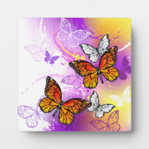 Monarchfalter auf violettem Hintergrund Fotoplatte