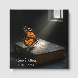 Monarchschmetterling auf einer Heiligen Bibel Gästebuch