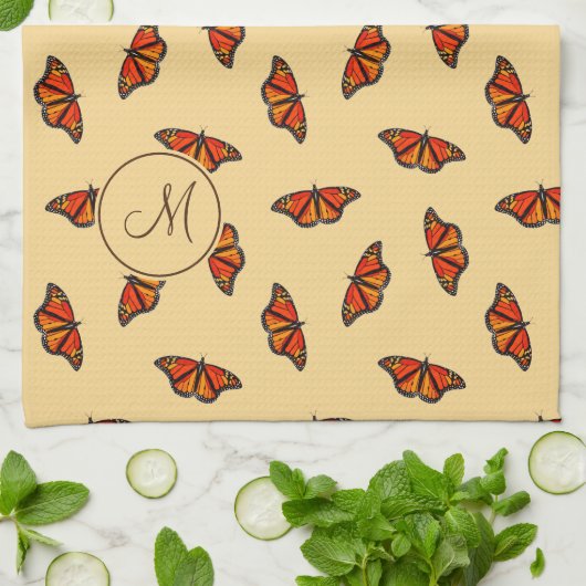 Monarchschmetterlinge Muster blassgelb w Monogramm Geschirrtuch (Gefaltet)