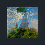 Monet Woman Parasol Impressionismus Button<br><div class="desc">Claude Monet Impressionismus Meisterwerk - Die Frau mit einem Parosol wurde 1875 vom französischen Impressionisten Claude Monet gemalt. Es zeigt eine Frau mit Sonnenschirm und ein kleines Kind, die Madame Monet und ihr Sohn ist. Dieses impressionistische Gemälde ist eines der berühmten Gemälde Monets, das eine schöne Landschaft mit leuchtend blauem...</div>