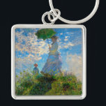 Monet Woman Parasol Impressionismus Schlüsselanhänger<br><div class="desc">Claude Monet Impressionismus Meisterwerk - Die Frau mit einem Parosol wurde 1875 vom französischen Impressionisten Claude Monet gemalt. Es zeigt eine Frau mit Sonnenschirm und ein kleines Kind, die Madame Monet und ihr Sohn ist. Dieses impressionistische Gemälde ist eines der berühmten Gemälde Monets, das eine schöne Landschaft mit leuchtend blauem...</div>