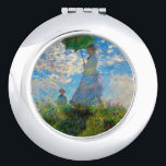 Monet Woman Parasol Impressionismus Taschenspiegel<br><div class="desc">Claude Monet Impressionismus Meisterwerk - Die Frau mit einem Parosol wurde 1875 vom französischen Impressionisten Claude Monet gemalt. Es zeigt eine Frau mit Sonnenschirm und ein kleines Kind, die Madame Monet und ihr Sohn ist. Dieses impressionistische Gemälde ist eines der berühmten Gemälde Monets, das eine schöne Landschaft mit leuchtend blauem...</div>