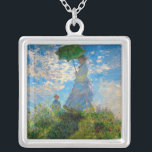 Monet Woman Parasol Impressionismus Versilberte Kette<br><div class="desc">Claude Monet Impressionismus Meisterwerk - Die Frau mit einem Parosol wurde 1875 vom französischen Impressionisten Claude Monet gemalt. Es zeigt eine Frau mit Sonnenschirm und ein kleines Kind, die Madame Monet und ihr Sohn ist. Dieses impressionistische Gemälde ist eines der berühmten Gemälde Monets, das eine schöne Landschaft mit leuchtend blauem...</div>