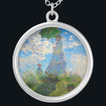 Monet Woman Parasol Impressionismus Versilberte Kette<br><div class="desc">Claude Monet Impressionismus Meisterwerk - Die Frau mit einem Parosol wurde 1875 vom französischen Impressionisten Claude Monet gemalt. Es zeigt eine Frau mit Sonnenschirm und ein kleines Kind, die Madame Monet und ihr Sohn ist. Dieses impressionistische Gemälde ist eines der berühmten Gemälde Monets, das eine schöne Landschaft mit leuchtend blauem...</div>