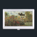 Monet's Garden in Argenteuil von Claude Monet Visitenkarten Etui<br><div class="desc">Der Artist's Garden in Argenteuil (Eine Ecke des Gartens mit Dahlias) (1873) von Claude Monet ist ein Vintager Impressionismus feiner Kunst Blumenmalerei. Ein Landhaus liegt im Hintergrund. Ein Paar in der Liebe geht vorbei an einem romantischen Frühlingsgarten mit blühenden Rose und anderen Blume. Über den Künstler: Claude Monet (1840-1926) war...</div>