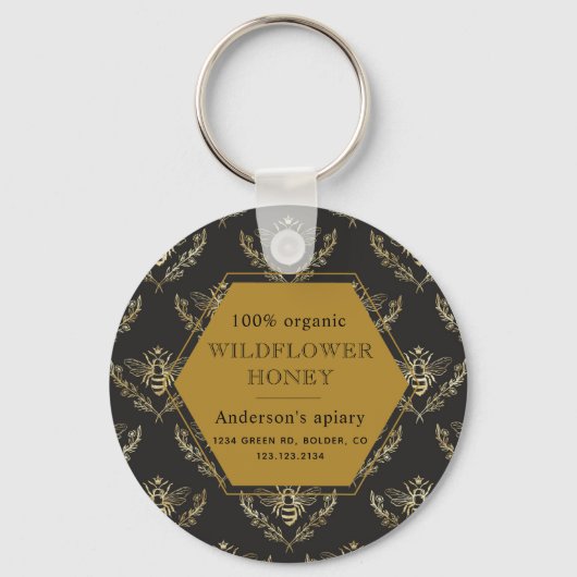 Monografie der Vintagen Goldkönigin Schlüsselanhänger (Vorderseite)