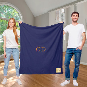 Monografie des Navy Blue Gold Firmenlogos Fleecedecke
