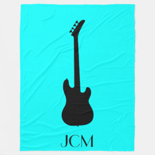 Monogram Black Electric Bass Gitarre auf Aqua Blue Fleecedecke