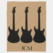 Monogram Black Electric Gitarren auf Camel Brown Fleecedecke (Vorderseite)