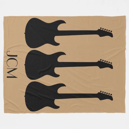 Monogram Black Electric Gitarren auf Camel Brown Fleecedecke (Vorderseite (Horizontal))