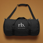 Monogram Classic Elegant Minimal Schwarz und Weiß Duffle Bag<br><div class="desc">Ein minimalistisches Monogramm-Design mit großen Typografie-Initialen in einem klassischen Schriftart mit Ihrem Namen unten auf einem einfachen schwarzen Hintergrund. Das perfekt angepasste Geschenk oder Accessoire!</div>