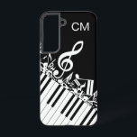 `Monogram coole Musical Notes and Piano Keys Samsung Galaxy Hülle<br><div class="desc">Ein perfektes Geschenk für den Musikliebhaber mit einem Design mit gerühmten musikalischen Noten und einem schwarz-weißen Klettverschluss mit Klaviertasten. Einfach mit Ihrem eigenen Text anpassen. Besuchen Sie den Laden,  um die Sammlung von Geschenken und Schreibwaren mit diesem musikalischen Design zu sehen. sgb01</div>