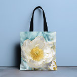 Monogram Elegante Blume Luxury Gold Watercolor Tasche<br><div class="desc">Monogram Elegant Simple White Blume Luxury Gold Watercolor Tragetaschen verfügen über eine schlichte weiße Blume mit stilvollen Goldfolienakzenten auf einem weichblauen Aquarellhintergrund. Perfektes Geschenk für Muttertag, Geburtstag, Weihnachten, Lehrergewinn und beste Freunde. Personalisieren Sie Ihre eigene Monografie, indem Sie den Text in der dafür vorgesehenen Textbox bearbeiten. Entworfen von ©Evco Studio...</div>