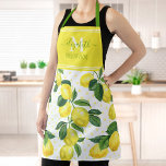 Monogram, moderner trendy lemon Aquarellpunkt Schürze<br><div class="desc">Hier ist ein wunderbarer Weg, um den Spaß des Backens zu ergänzen. Genießen Sie kulinarische Abenteuer, wenn Sie diese schicke, trendige, moderne, maßgeschneiderte Schürze mit Monogramm tragen. Frische, rustikale, ländliche Aquarellfarben und grüne Blätter überlagern hellgelbe Polka-Punkte auf weißem Hintergrund. Außerdem überlagert die handgeschriebene Schriftzeichen-Schrift Grasgrün, zusammen mit einem weißen Monogramm-Initial...</div>