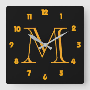 Monogram Orange Numbers On Black wccn Quadratische Wanduhr