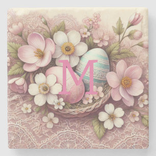Monogram Spitzenpink-Blüteneier Ostereier in einem Steinuntersetzer