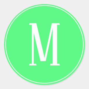 Monogram White auf dem hellgrünen Rundkleber Runder Aufkleber