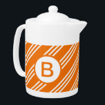 Monogramm<br><div class="desc">Sportlich gestreiftes orangefarbenes mit Monogramm Teekessel.</div>