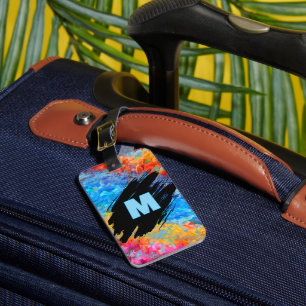 Monogramm auf regenbogenfarbenem abstraktem Hinter Gepäckanhänger