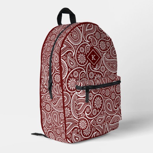 Monogramm aus dunkelrotem und weißem Paisley Bedruckter Rucksack (Rückseitige Ecke links)