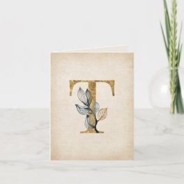 Monogramm aus Gold und Schwarz mit Blätter