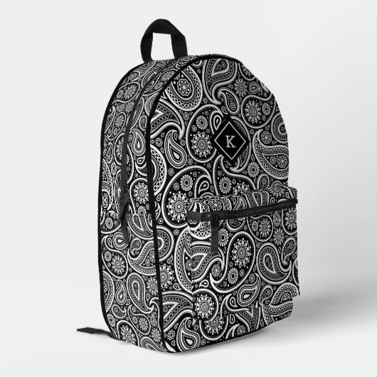 Monogramm aus schwarzweißem Paisley Bedruckter Rucksack (Rückseitige Ecke links)