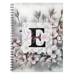 Monogramm-Blumenzeichnung rosa Kirschblüte Notizblock