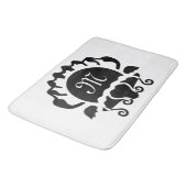 Monogramm der schwarzen Clam-Silhouette Badematte (Schrägansicht)