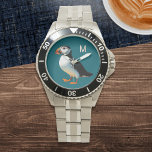 Monogramm des Bargelds Armbanduhr<br><div class="desc">Genießen Sie den Charme des Atlantic Puffin mit dieser eleganten Uhr. Dieses Zeitwerk illustriert das bezaubernde Meeresvogel-Set vor einem ozeanblauen Hintergrund und ist ideal für alle, die ein stilvolles, naturlich inspiriertes Design suchen. Das Uhrengesicht kann mit dem ersten als Monogramm personalisiert werden, und dieses auffällige Accessoire wird um ein eigenes...</div>