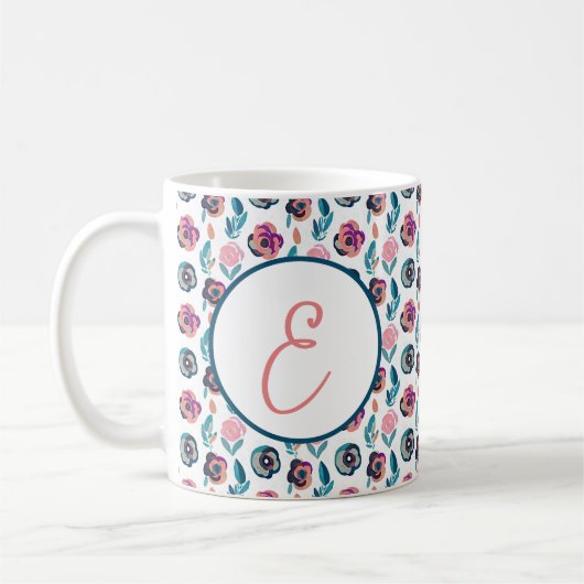 Monogramm des blauen und rosa Blumenmusters Kaffeetasse (Links)