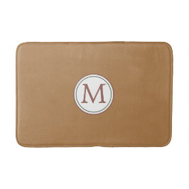 Monogramm des weißen Kreises Banner auf braun Badematte