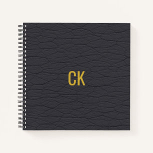 Monogramm-Initialen des modernen schwarzen Ledermu Notizblock