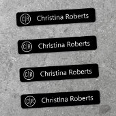 Monogramm-Initialen und schwarze Textilien Etiketten